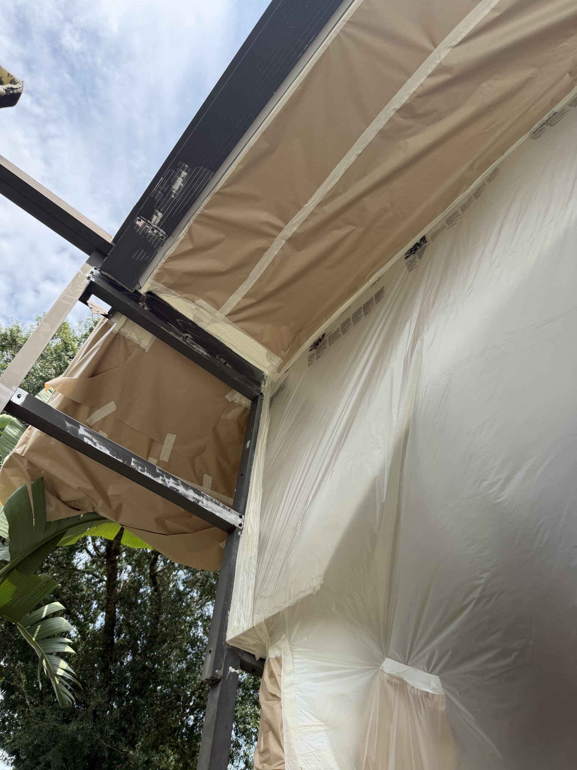 Carrollwood Tampa pool cage being prepared and protected for restoration