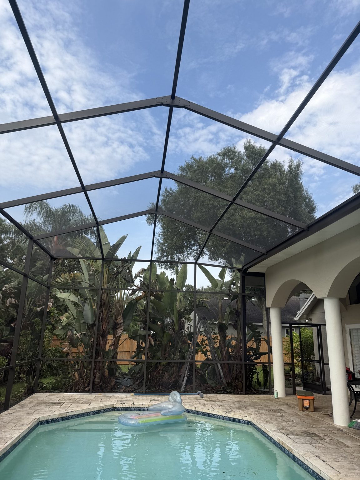 Completed Carrollwood pool enclosure painting and rescreening in Tampa Florida